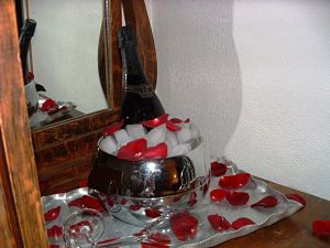 Wedding package with champagne and rose pedals