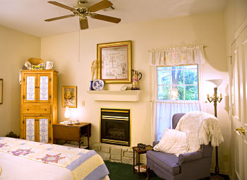 homesteaders bedroom with armour and fireplace