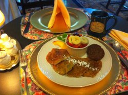 breakfast platter with fruit and sausage