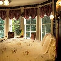 victorian bed with windows