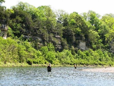 fly fisherman in river