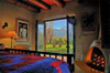 Candle lit Kiva fireplace and views of Taos Mountain