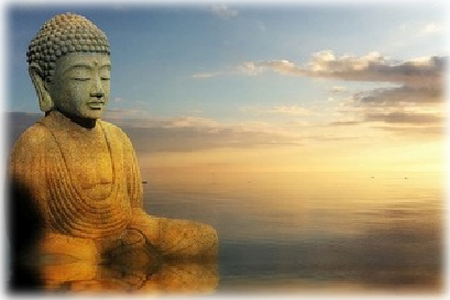 budda statue next to the ocean at sunset or sunrise