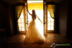 bride opening french doors