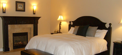 Bed and fireplace in bedroom