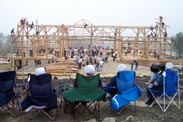 Amish women watching barn raising