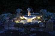 The grounds at night at The Barn Inn