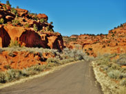 Road by rock formation