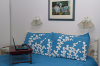 Blissfully Blue Bed with Laptop