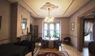 dining room with piano