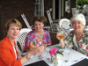 Guests dining on porch