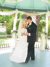 Couple dancing under gazebo