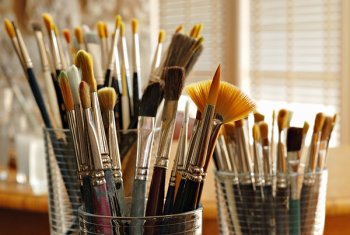 Paintbrushes in jars