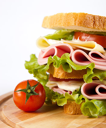 Huge sandwich with tomatoes