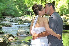 Romantic couple by stream in Smoky Mountain National Park