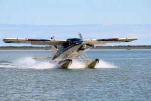 Alaska float plane landing in remote location