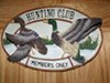 Hunting club with ducks