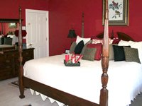 bed and dresser in the Cardinal room
