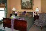 window, bed and armchair
