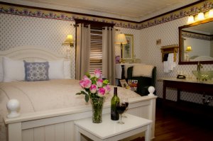 bed and chair with roses