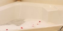 jacuzzi tub with rose petals