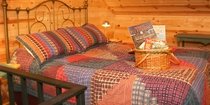 bed at the top of the stairs
