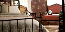 bed and couch in the Tower Room