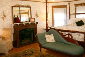 bed, couch and fireplace