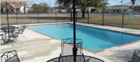 pool with umbrellas and chairs