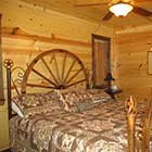 bedroom in Crazy Horse Cabin at Hochatown Junction in Broken Bow, OK