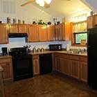 kitchen area in Stormy Ridge Cabin at Hochatown Junction in Broken Bow, OK