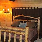 bed in Sugar Shanti Cabin at Hochatown Junction in Broken Bow, OK