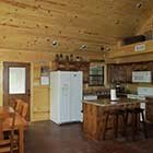 kitchen area in Sugar Shanti Cabin at Hochatown Junction in Broken Bow, OK