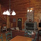 Living room in Bear Necessities Cabin at Hochatown Junction in Broken Bow, OK