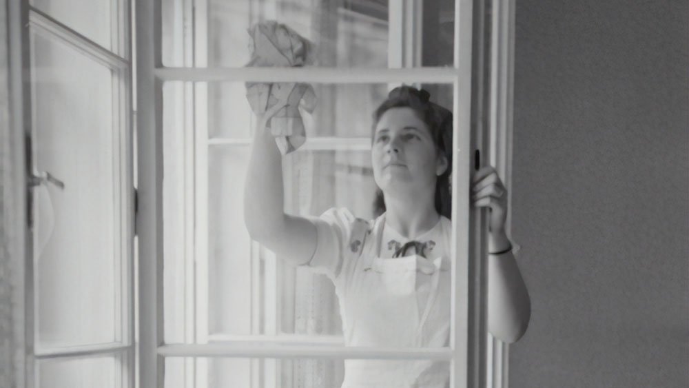 woman cleaning windows